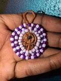 Purple glass bead pendant