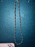 White+rainbow single strand necklace