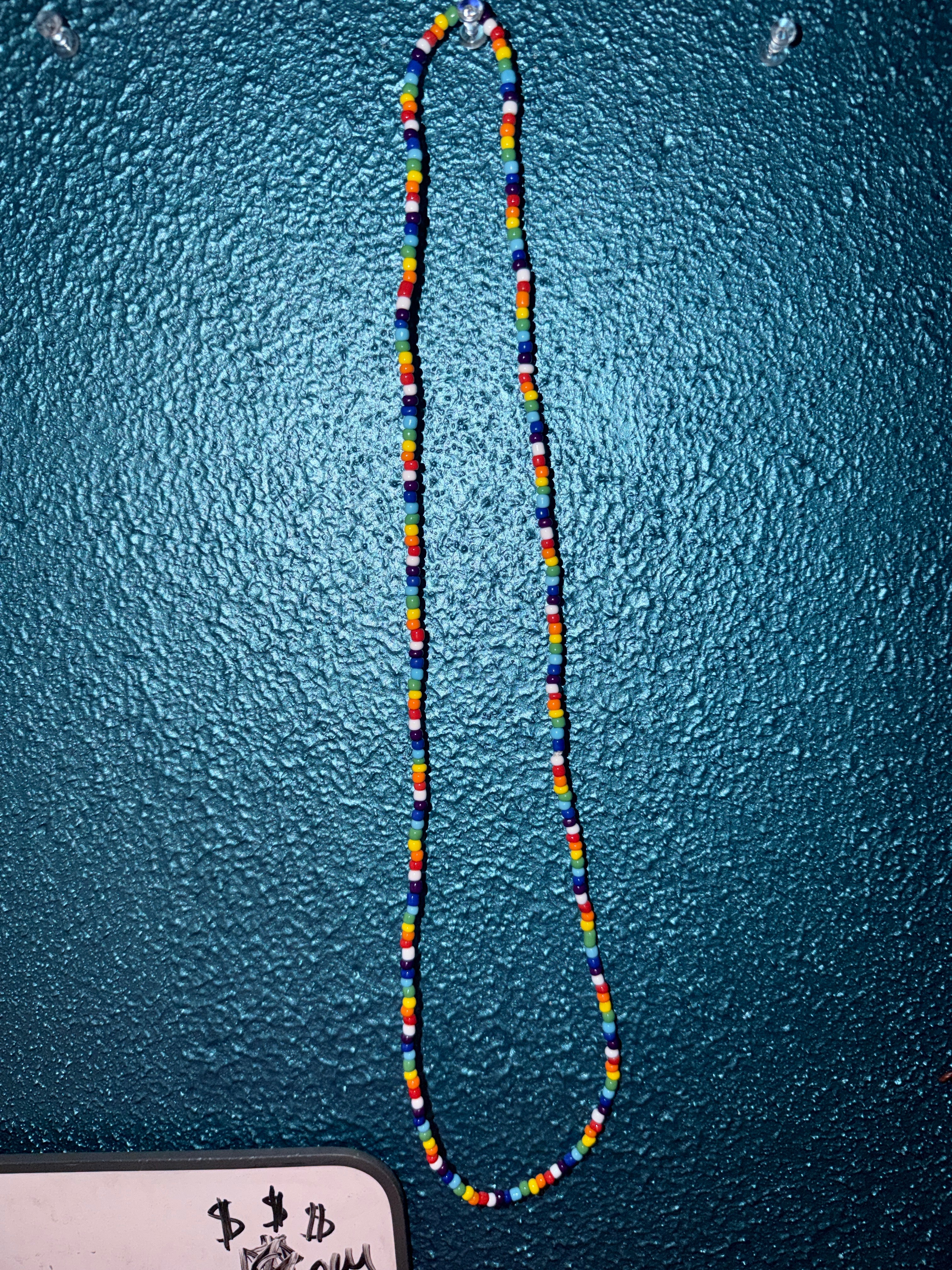White+rainbow single strand necklace